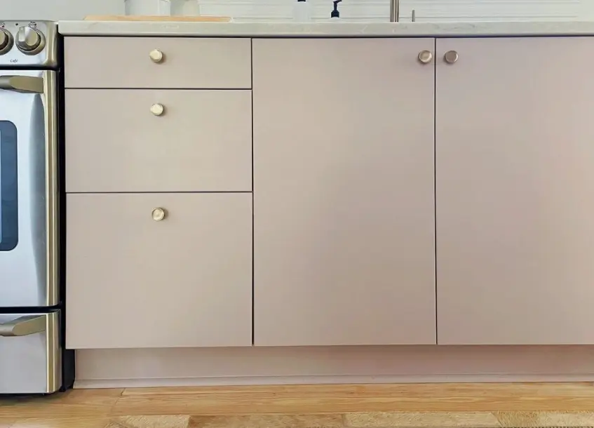 Installed flat slab melamine cabinet doors and matching drawer fronts