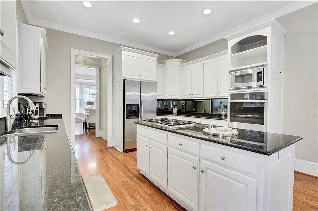 White kitchen with island